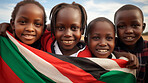 Group of diverse kids holding a flag. Educate and celebrate different nationalities and countries