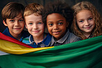 Group of diverse kids holding a flag. Educate and celebrate different nationalities and countries