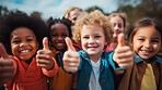 Group of kids showing thumbs up. Happy, healthy and positive children