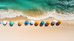 Aerial drone view of tropical shoreline and waves, clean turquoise beach