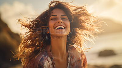 Portrait of a young woman at the beach enjoying free time and freedom outdoors