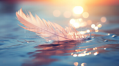 Closeup white feather floating on water. Peace, hope, and faith concept