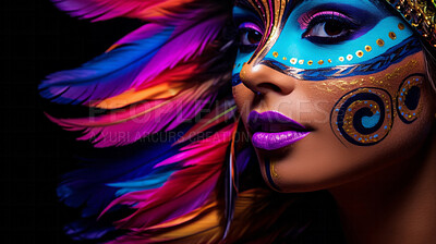 Closeup colorful makeup or face paint and feathers on model. Creative art background