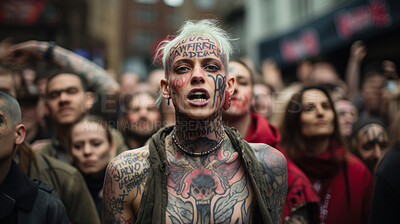 Street style portrait of tattooed man in street march. Alternative lifestyle concept.
