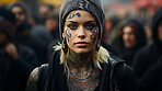 Portrait of attractive tattooed model in street. Alternative lifestyle concept.