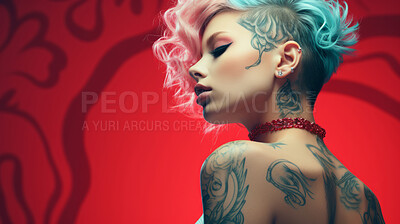 Confident tattooed model on red backdrop. Alternative beauty concept.