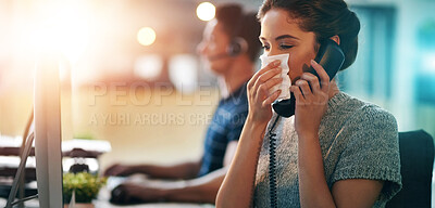Buy stock photo Sick, phone call and a woman blowing nose for allergies, virus or flu while at work. Contact, business and a young female employee talking on a telephone with a disease, covid or allergy in an office