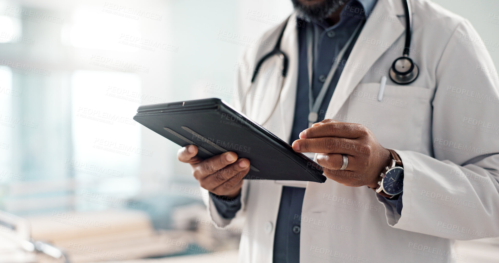 Buy stock photo Closeup, man and doctor with a tablet, internet or connection with online results, digital app or typing. Person, employee or medical professional with technology, healthcare or website information