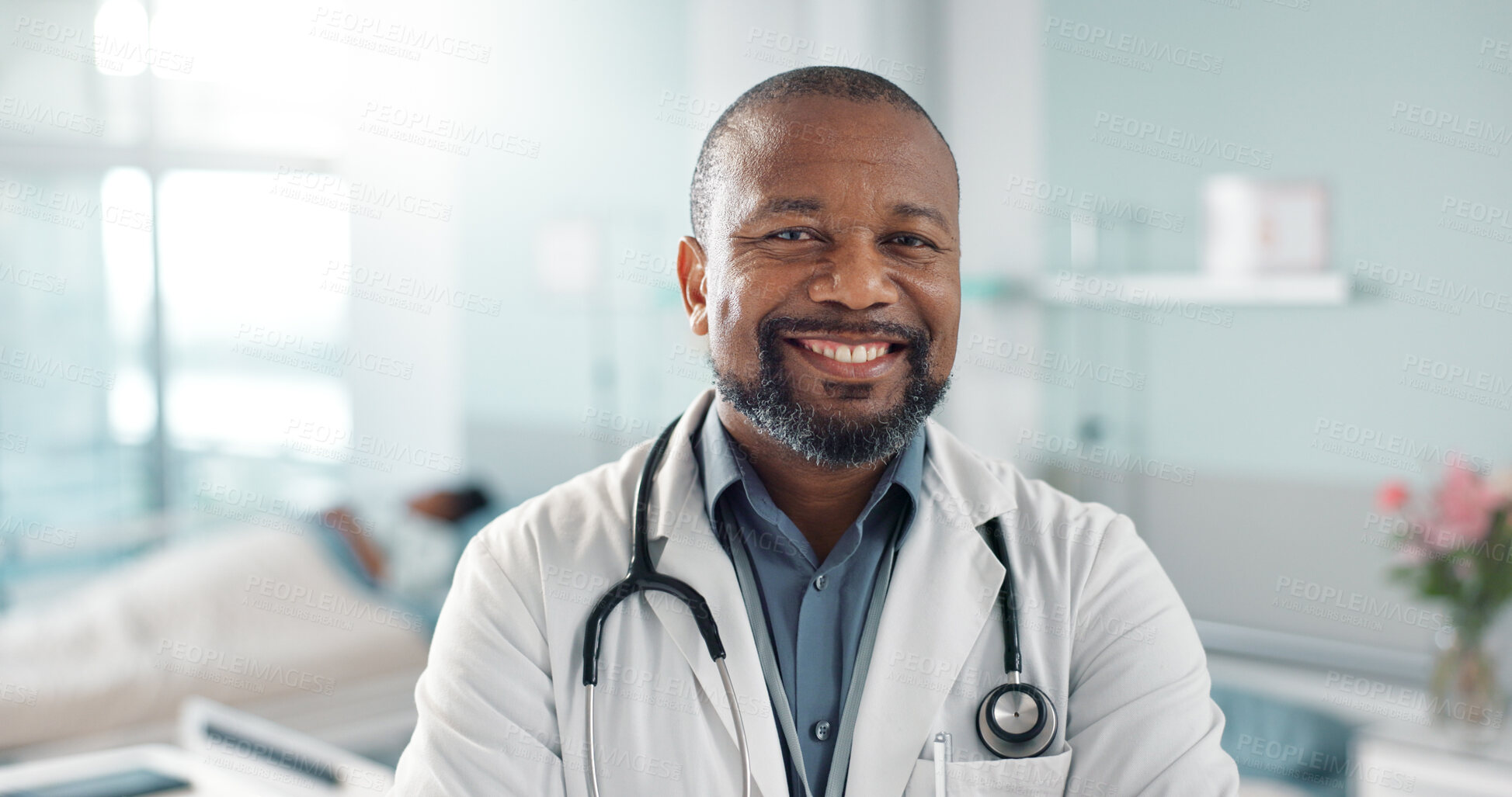 Buy stock photo Healthcare, doctor and black man with arms crossed at hospital with smile for support, service and wellness. Medicine, professional and African expert with happiness and pride for career or surgery