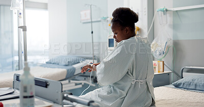 Patient, hospital and thinking black woman after medical surgery for healthcare service, assessment or treatment. Consultation, medicine and sick person is sad in a clinic for health and depressed