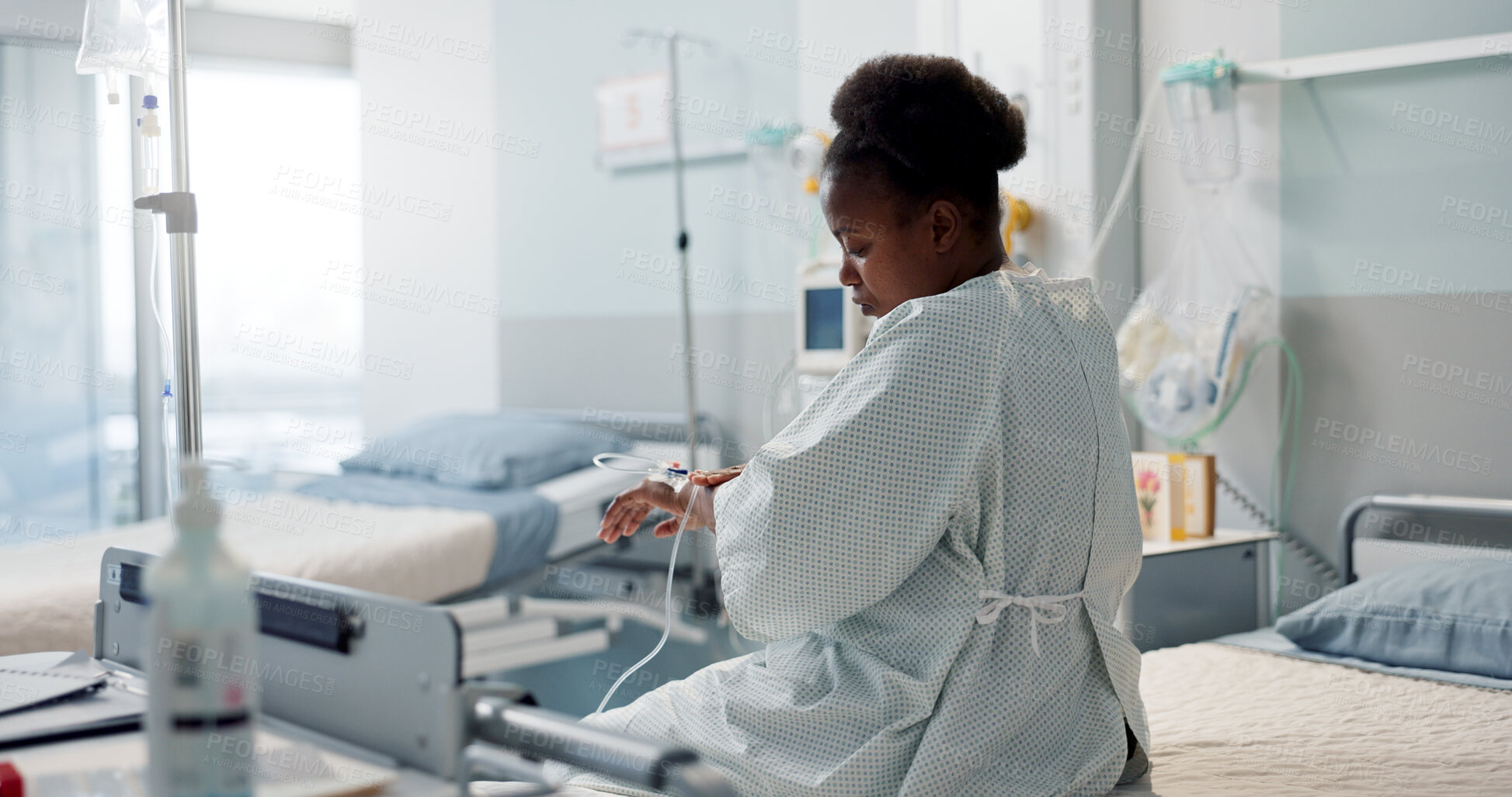 Buy stock photo Patient, hospital and thinking black woman after medical surgery for healthcare service, assessment or treatment. Consultation, medicine and sick person is sad in a clinic for health and depressed