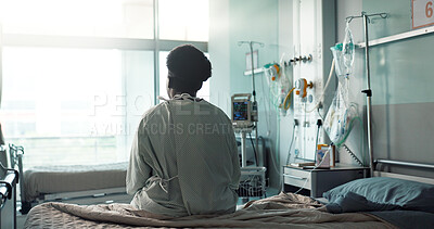 Patient, hospital and sitting on bed with sad, depression and worry for heart disease diagnosis. Black person, treatment and healthcare in medical center, heart monitor and emergency with therapy