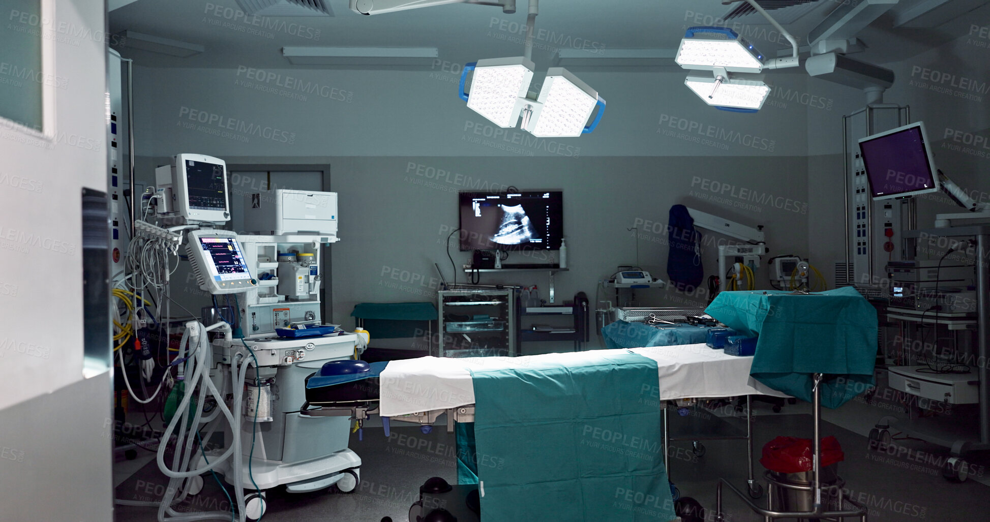 Buy stock photo Empty, dark hospital and room for operation, emergency service and healing patient. Healthcare backgrounds, surgery theatre and interior of bed, machine and medical tools for wellness, help and risk