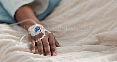 Person hand, bed and drip in closeup, clinic or treatment for hydration, liquid or supplement. Patient, healthcare and wellness with blood transfusion, anesthesia or pharma drugs for pain in hospital