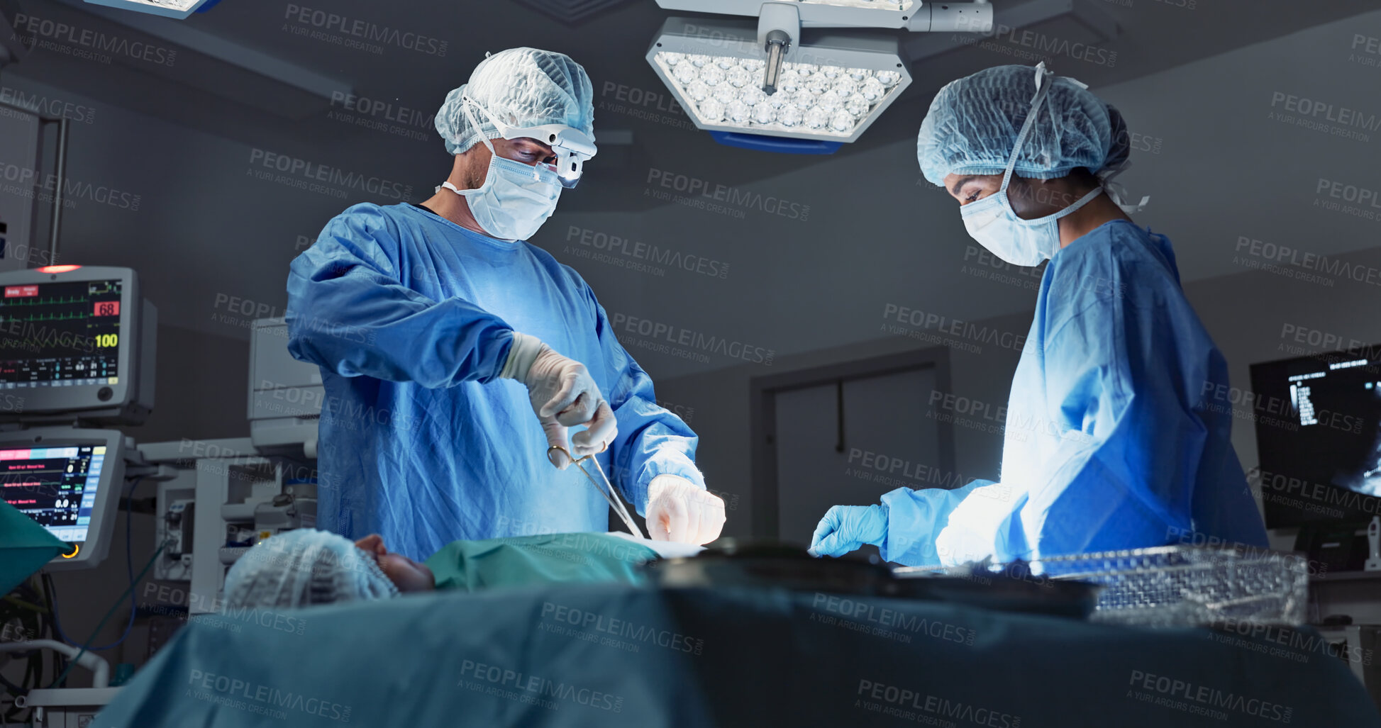 Buy stock photo Doctor, patient and surgery in hospital, nurses and operation ,medical, diagnosis and treatment. Healthcare, sick and scissors for help, surgeon and specialist on bed, working, and operating body