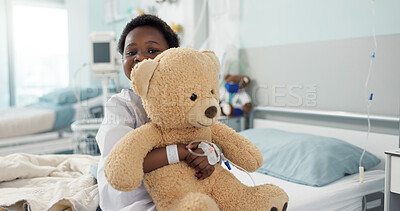 African boy child, hospital and teddy bear on bed with face, smile and rest for recovery for healthcare treatment. Patient kid, happy and portrait to relax, clinic and hug with toys after surgery