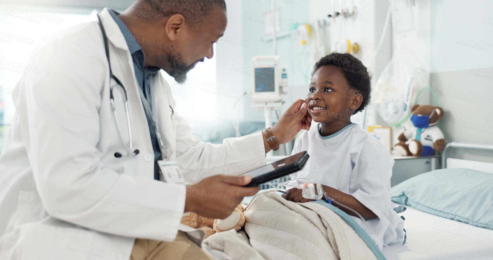 Buy stock photo Doctor, African boy kid and hospital with tablet, smile and rest for recovery from surgery, treatment or inspection. Child patient, medic and check with touchscreen, talk and rehabilitation in clinic