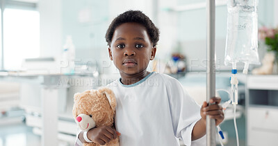 African child, sick in hospital and teddy bear for healthcare, wellness or treatment on iv drip. Portrait, serious and face of kid in pediatric clinic with toys for recovery from surgery or healing