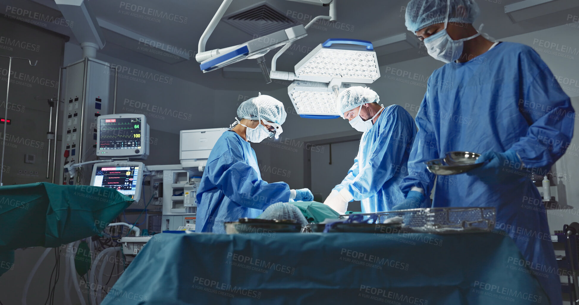 Buy stock photo Doctors, team and surgery in theater with medical support for healthcare, safety and operation room at hospital. Surgeon, medicine and teamwork or collaboration with tools for cardiology or emergency