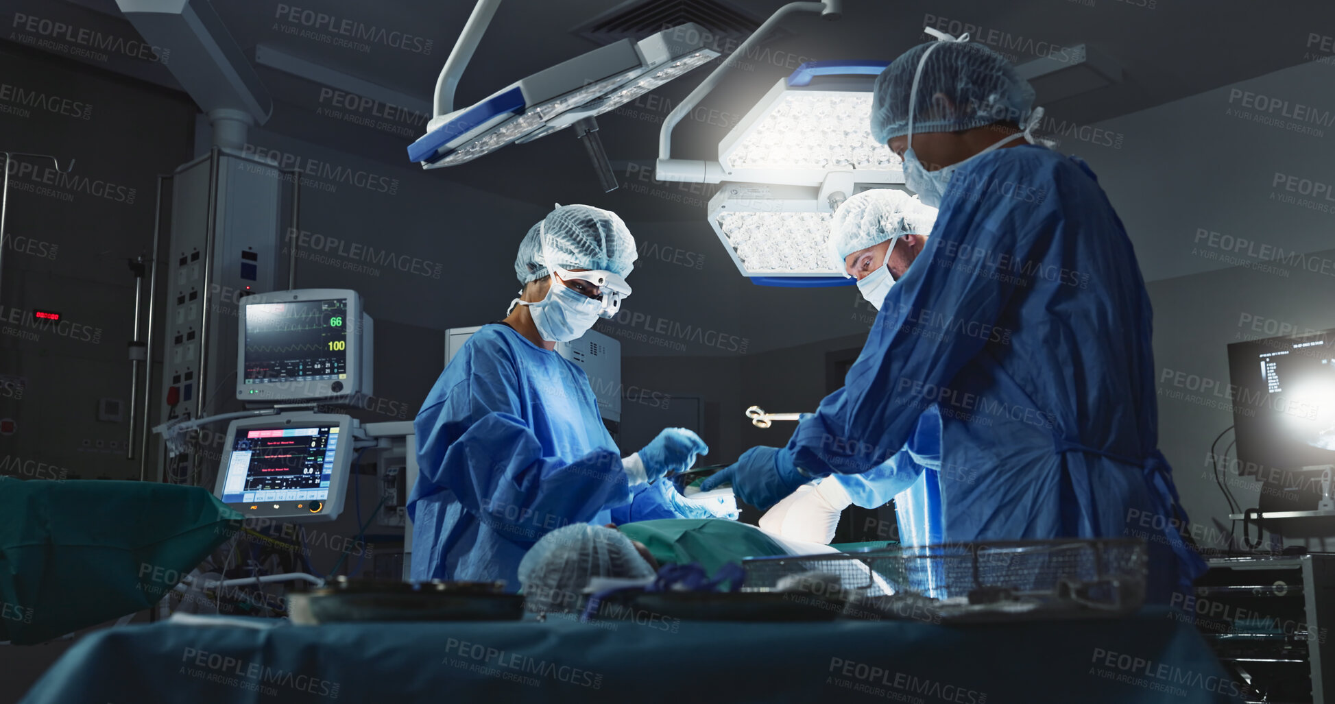 Buy stock photo Doctors, team and surgery in theater with medical support for healthcare, safety and operation room at hospital. Surgeon, medicine and teamwork or collaboration with tools for cardiology or emergency