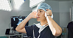 Surgery, doctor and man with face mask in hospital theatre for medical service, preparation and operation. Healthcare, safety scrubs and person with uniform for emergency, procedure and protection