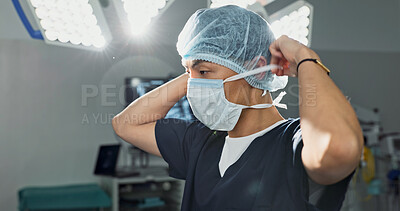 Surgery, doctor and man with face mask in hospital theatre for medical service, preparation and operation. Healthcare, safety scrubs and person with uniform for emergency, procedure and protection