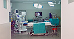 Empty hospital, medical and operation room for emergency service, healing patient and interior. Healthcare backgrounds, surgery theatre and bed with machine tools for wellness, medicine and treatment