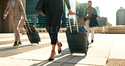 Business, legs and luggage for travel in city with corporate people walking to hotel, airport or business opportunity. Professional woman or men feet and steps with suitcase outdoor in career journey