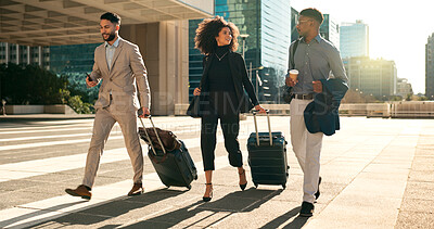 Business people, team walking and travel with suitcase in city for corporate, job opportunity and networking. Professional woman and men talking at outdoor hotel or on the way to airport with luggage