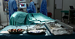 Surgery, healthcare and tools in operation theatre, help in medicine with treatment and closeup of equipment on table. Metal, medical and surgical instrument with doctor people at hospital for health