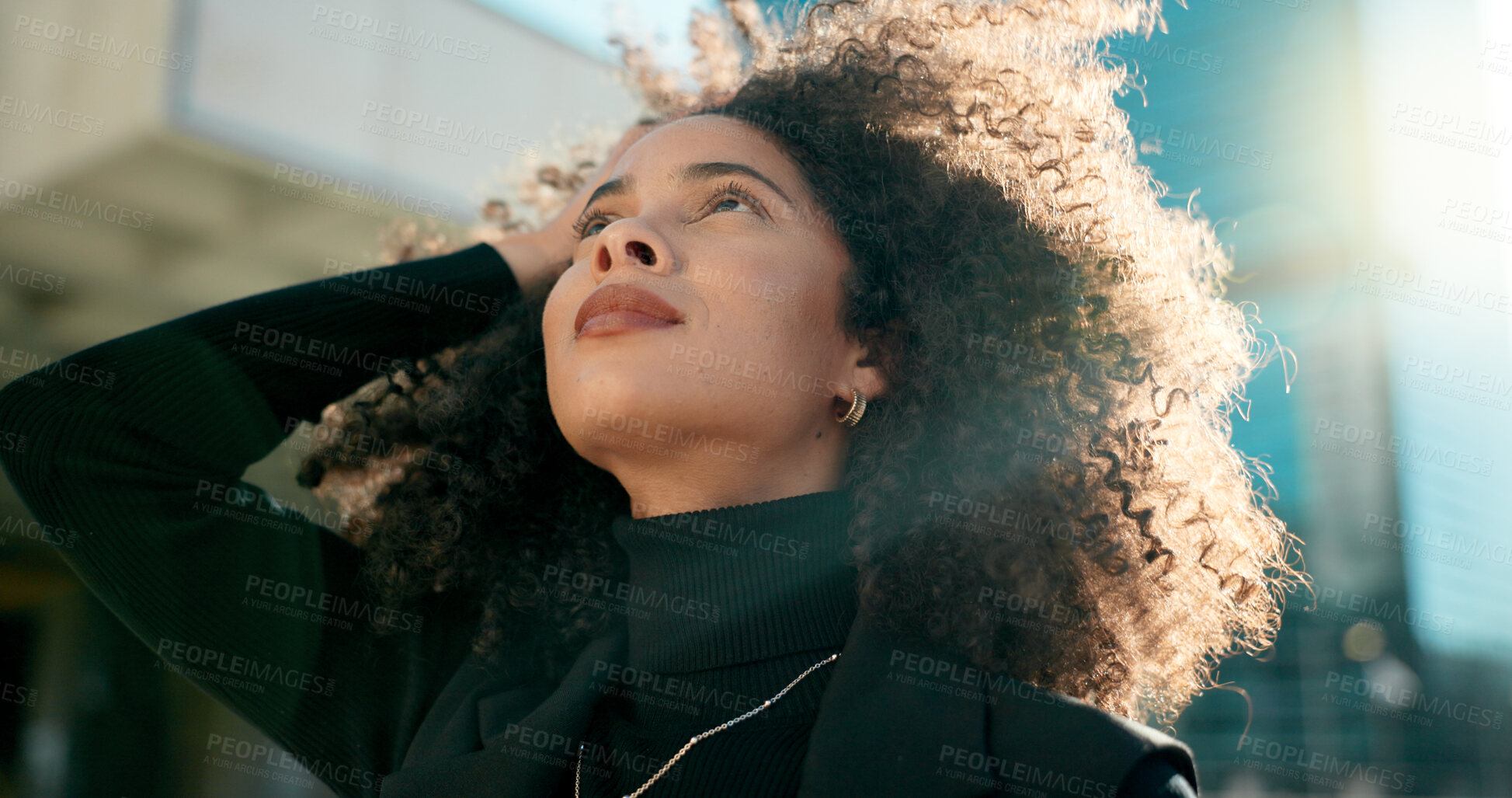 Buy stock photo Face, thinking and wind with a business black woman in the city for growth, opportunity or inspiration. Vision, street and smile with a happy young employee looking around an urban town for ideas