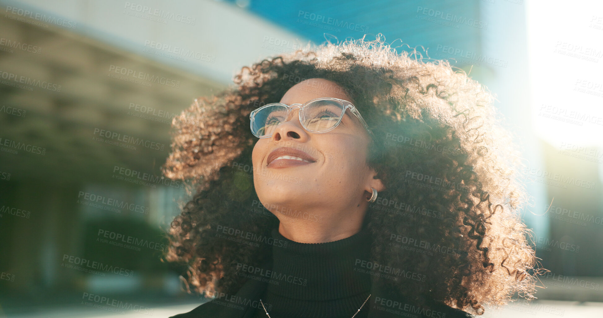 Buy stock photo Face, vision and wind with a business black woman in the city for growth, opportunity or inspiration. Thinking, street and smile with a happy young employee looking around an urban town for ideas