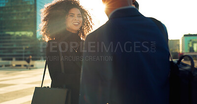 Business woman, people handshake and city for b2b partnership, outdoor deal and travel meeting or success. Professional employees or clients shaking hands, group introduction or talking in lens flare