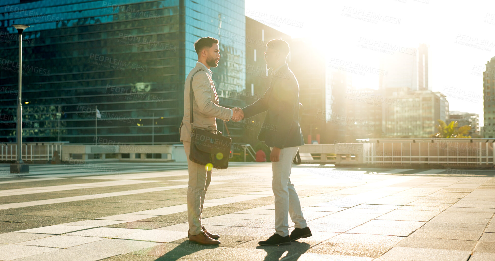 Buy stock photo Teamwork, greeting or business people shaking hands in city for project agreement or b2b deal. Hiring, outdoor handshake or men meeting for a negotiation, offer or partnership opportunity on rooftop