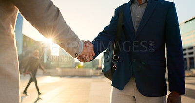Teamwork, walking or business people shaking hands in city for project agreement or b2b deal. Hiring, outdoor handshake or men meeting for a negotiation, offer or partnership opportunity together