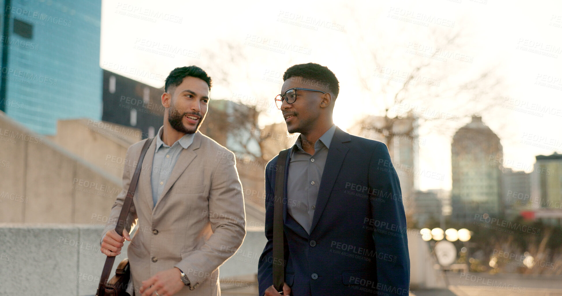 Buy stock photo Businessmen, morning sunrise and walking to work while talking, strategy idea and business investment. Discussion, city buildings and colleagues commute together to plan, startup company and idea