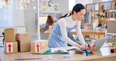 Ecommerce, Asian woman with checklist and boxes at laptop, reading sales or inventory at fashion startup. Online shopping, delivery and small business owner, stock list for web shop package checking.