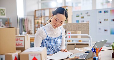 Buy stock photo Ecommerce, woman with phone call and boxes, writing and checking sales and work at Japanese fashion startup. Online shopping, package and small business owner with smartphone, orders and networking.