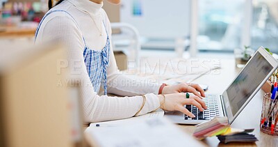 Ecommerce, hands of woman at laptop with typing and writing sales report for work at fashion startup. Online shopping, boxes and small business owner with happiness, computer and website shop at desk