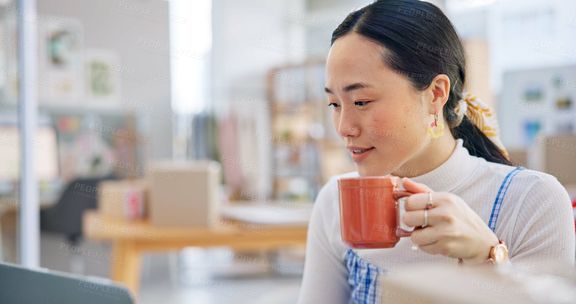 Buy stock photo Ecommerce, Asian woman at laptop with coffee and boxes, checking sales email or work at fashion startup. Online shopping, distribution and small business owner with drink, computer and review at desk