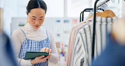 Fashion, small business and Asian woman with a tablet, store and retail with ecommerce, connection and search internet. Person, shop assistant and worker with technology, boutique and online shopping