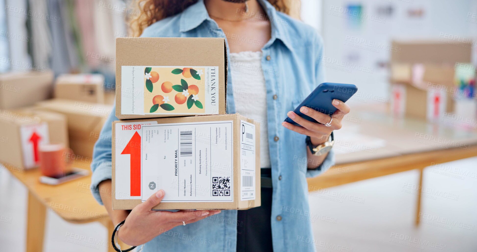 Buy stock photo Package, startup and closeup of woman with phone for business at a fashion retail boutique. Networking, technology and female entrepreneur with cardboard boxes and cellphone for delivery information.