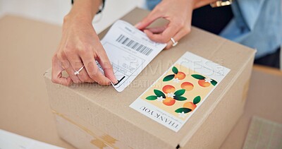 Buy stock photo Online order, delivery label and woman hand with small business sticker for cardboard box. Stock, startup process and sales of ecommerce and boutique at home of a entrepreneur with courier package