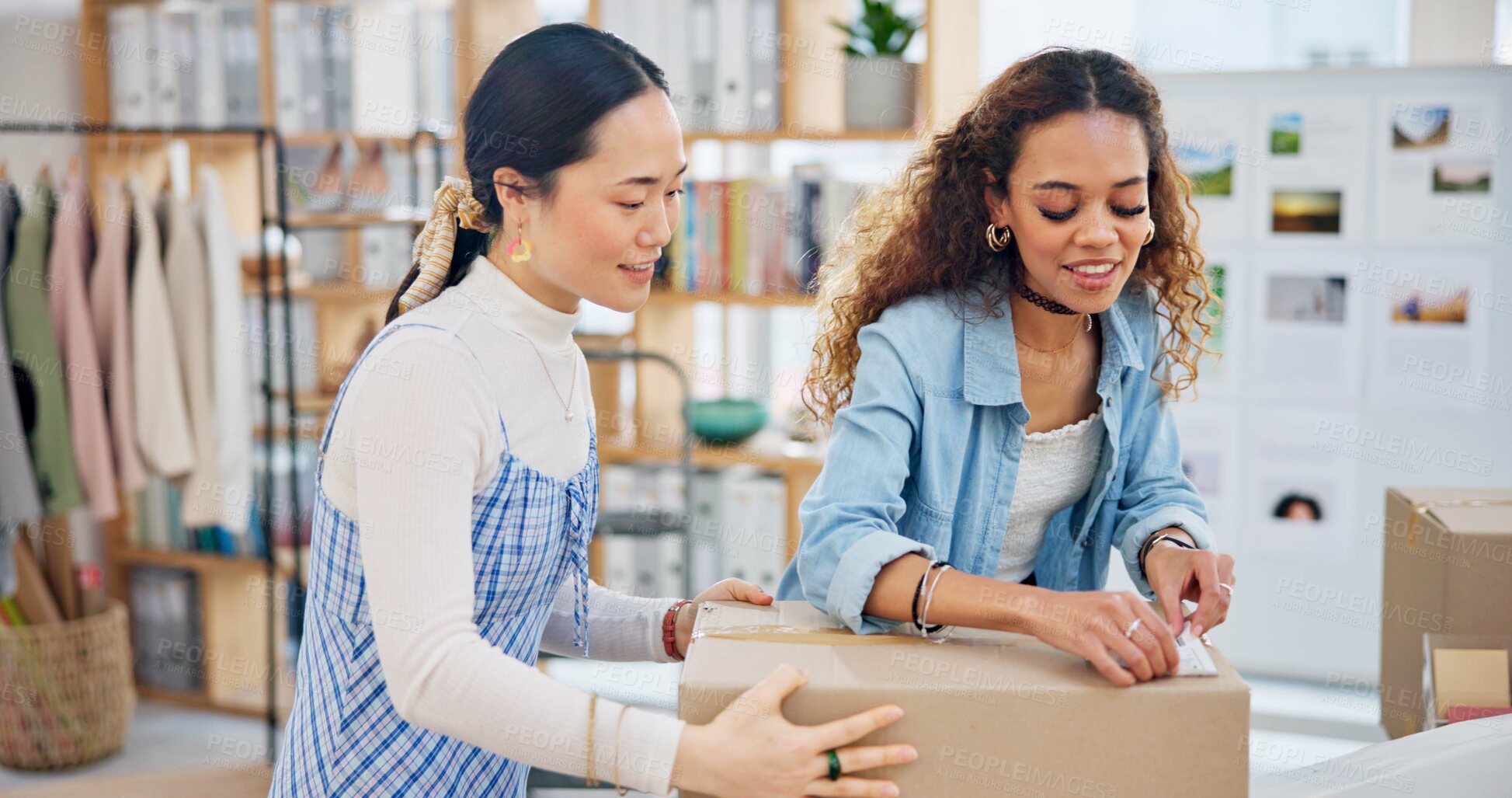 Buy stock photo Teamwork, women and tape on box for shipping, delivery and export in fashion store. Small business, closing and packaging of cargo for ecommerce, supply chain and safety with designer collaboration