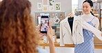 Fashion influencer, phone broadcast or Asian woman, small business owner and streaming clothes, design or leather jacket. Mobile shooting, ecommerce video blog and Japanese person show retail product