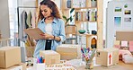 Online order, label check and woman with small business in fashion with delivery and cardboard box. Stock, startup and sales of ecommerce and web boutique at home of a entrepreneur with checklist