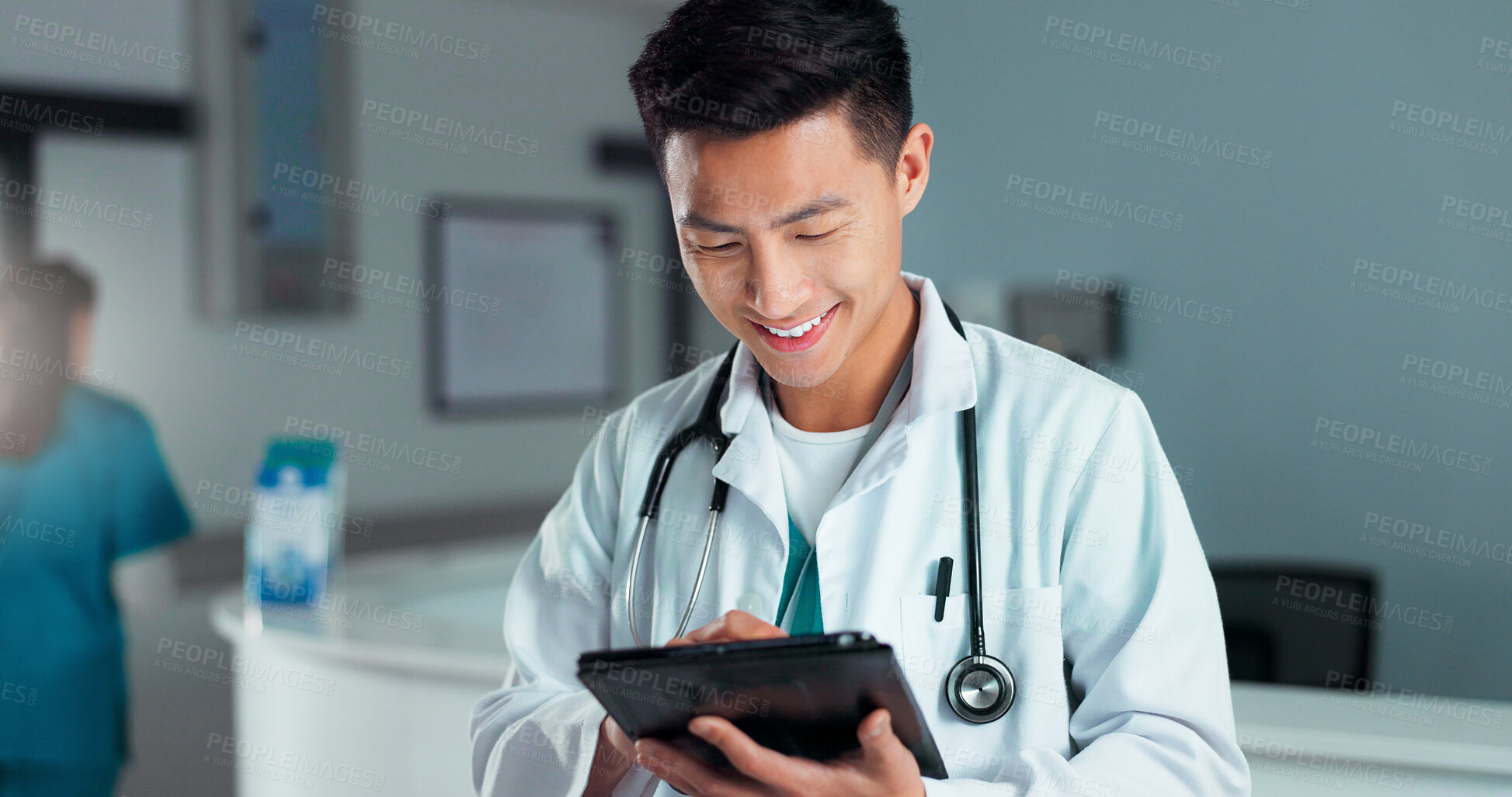 Buy stock photo Tablet, healthcare doctor and happy man typing online research, check medicine study and smile for wellness results. Hospital service, happiness and surgeon reading clinic review, feedback or news