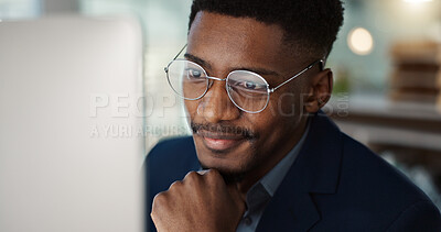 Happy, businessman and reading email on computer in office with a smile for feedback or online communication. Black man, thinking or happiness for working with research, inspiration or ideas in Kenya