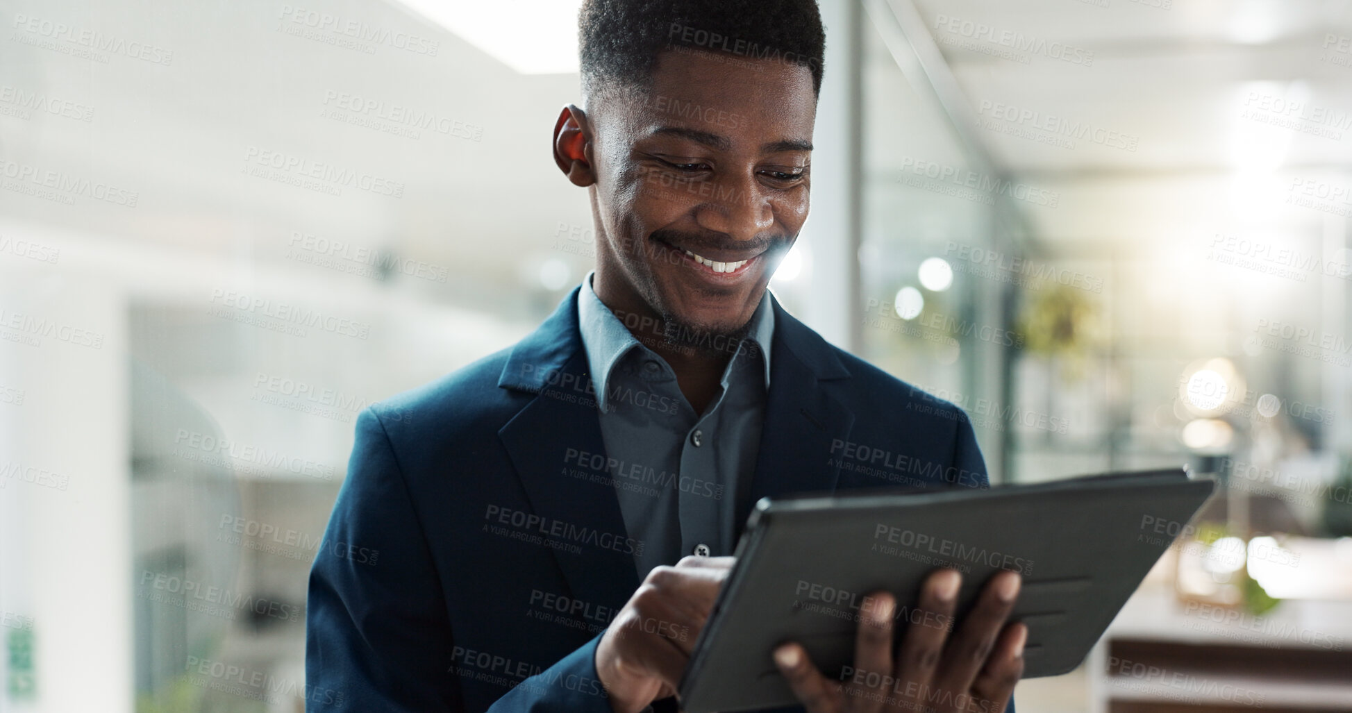 Buy stock photo Tablet, networking and businessman in the office typing a message on the internet or mobile app. Digital technology, chatting and African male lawyer scroll on social media or website in workplace.