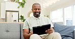 Technology, mature man with tablet and in living room of his home happy for social media. Online communication or networking, connectivity or leisure and black male person on couch with smile